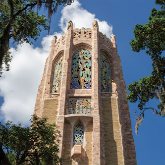 Bok Tower rising above tree branches. Read about Gifts by Estate Note Bok Tower rising above tree branches. Read about Gifts by Estate Note