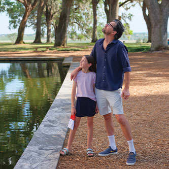 A father with his daughter. Link to Life Stage Gift Planner Under Age 60 Situations.