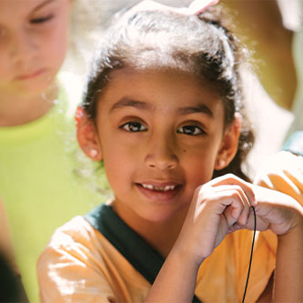 A smiling little girl. Read about Gifts That Protect Your Assets A smiling little girl. Read about Gifts That Protect Your Assets